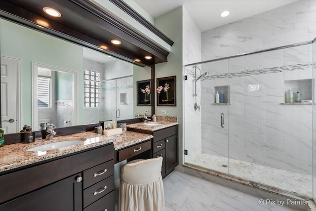 bathroom with vanity and an enclosed shower