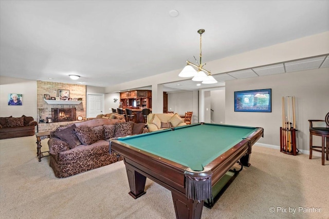 playroom with a fireplace, light colored carpet, and billiards