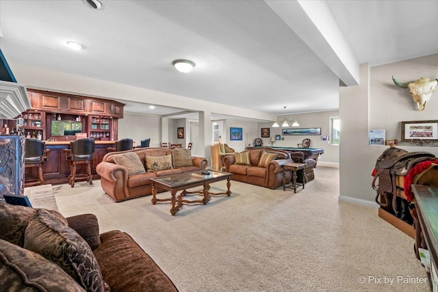 carpeted living room featuring indoor bar and pool table