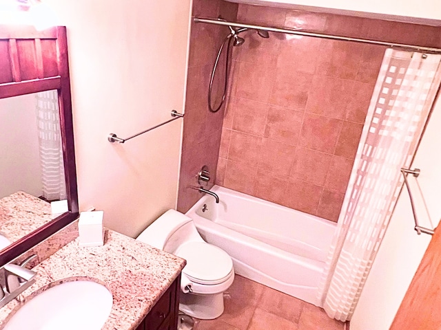 full bathroom featuring vanity, toilet, and shower / bath combo with shower curtain