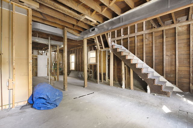 basement with sink and water heater