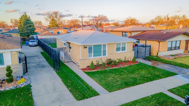 view of front of house with a yard