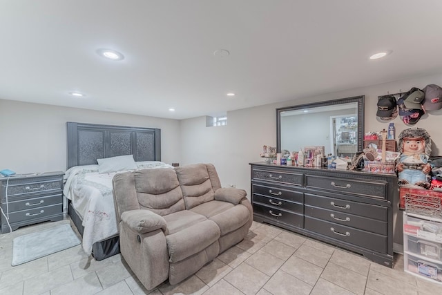 bedroom with light tile patterned flooring