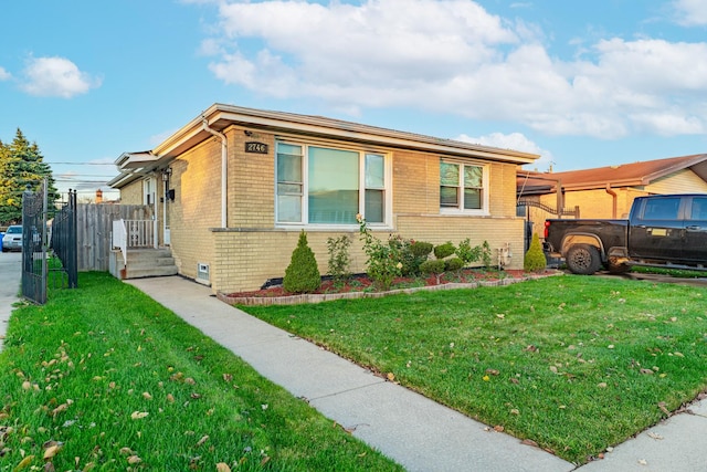 view of front of property featuring a front yard