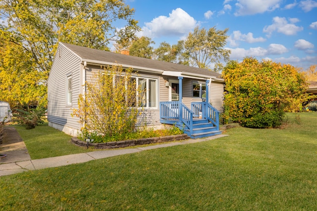 view of front of home featuring a front lawn