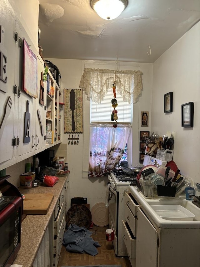 kitchen with dark parquet floors