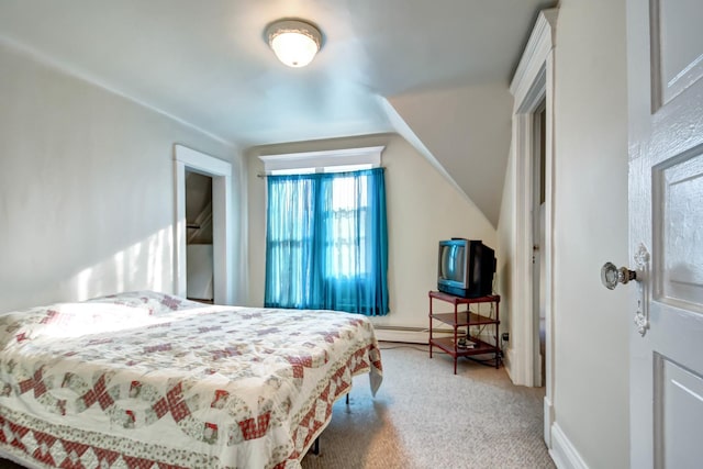 carpeted bedroom featuring vaulted ceiling