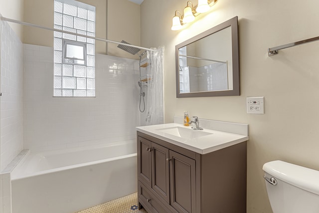 full bathroom with tile patterned flooring, shower / tub combo with curtain, vanity, and toilet