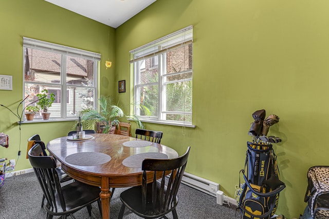 dining area featuring carpet floors and a wealth of natural light