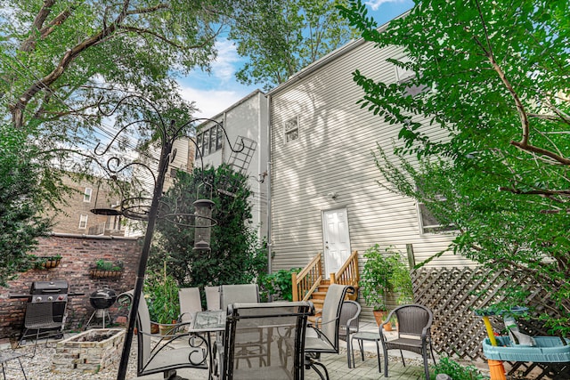 view of patio with a grill