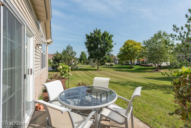 view of patio with outdoor dining area