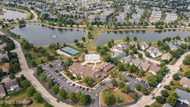 aerial view with a residential view and a water view