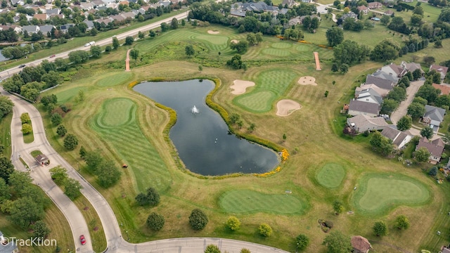 aerial view featuring a water view, a residential view, and golf course view