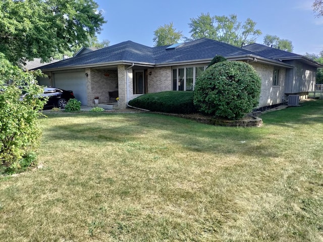 single story home with a front yard, a garage, and cooling unit