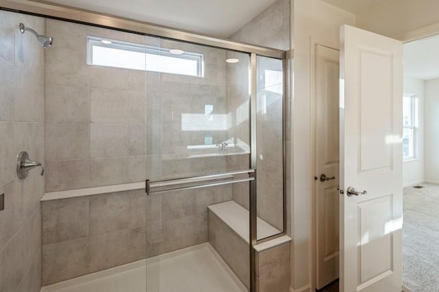 bathroom featuring walk in shower