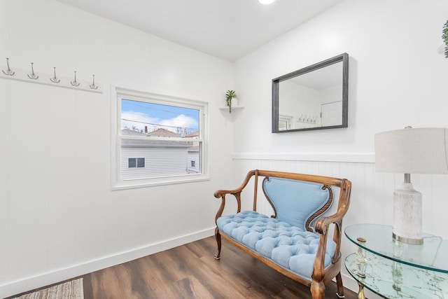 living area with hardwood / wood-style flooring