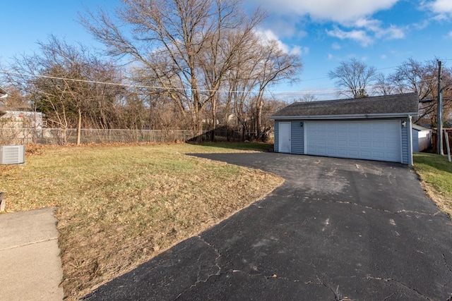 view of yard with a garage and an outdoor structure