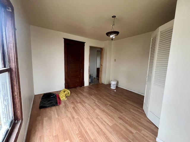 unfurnished bedroom with light hardwood / wood-style flooring