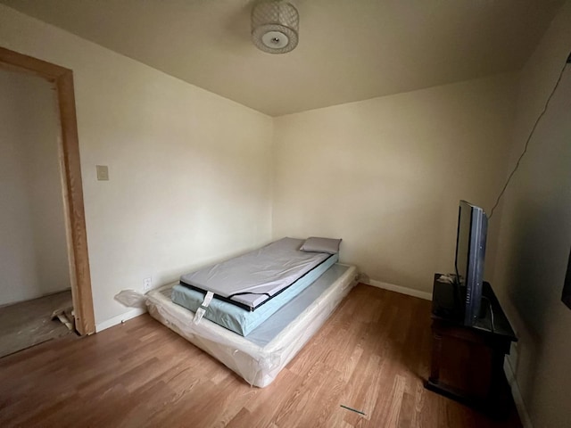 bedroom featuring hardwood / wood-style floors