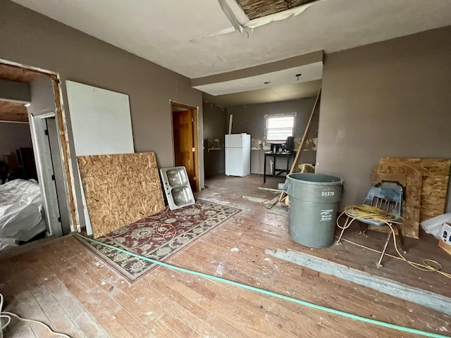 miscellaneous room with hardwood / wood-style floors