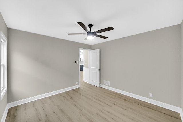 unfurnished bedroom featuring light wood-type flooring and ceiling fan