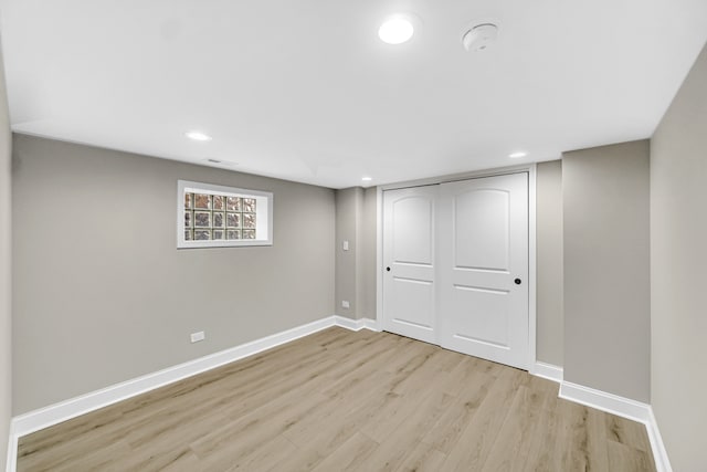 basement with light wood-type flooring