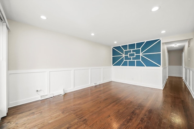 empty room featuring hardwood / wood-style floors