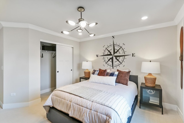 bedroom featuring a closet, light colored carpet, a notable chandelier, and ornamental molding