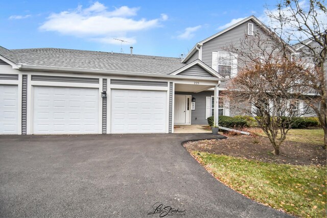 view of property featuring a garage