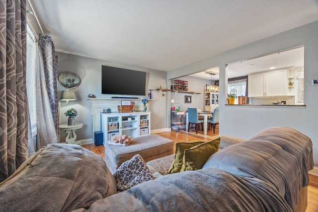 living room with light hardwood / wood-style flooring