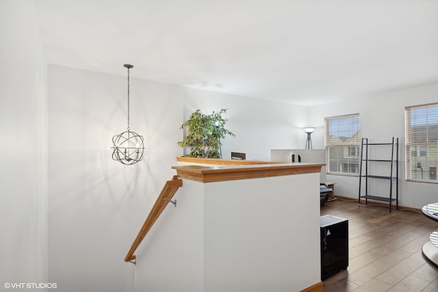 stairway featuring hardwood / wood-style floors