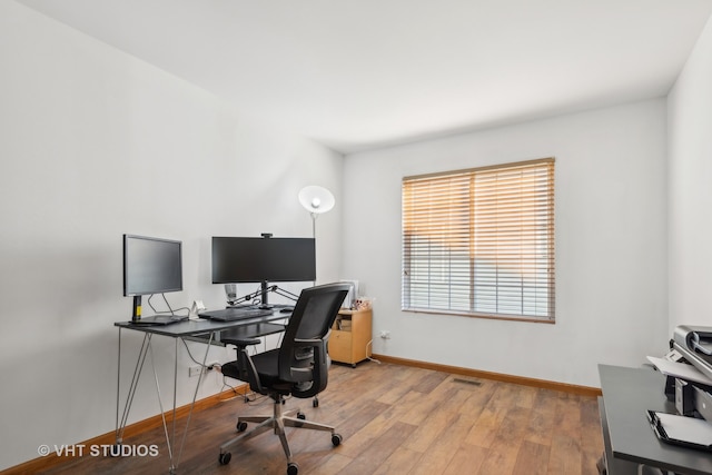 office featuring hardwood / wood-style floors