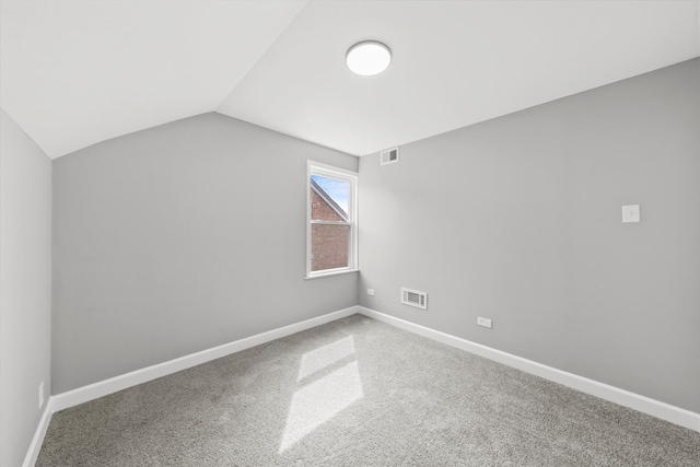 bonus room featuring carpet and lofted ceiling