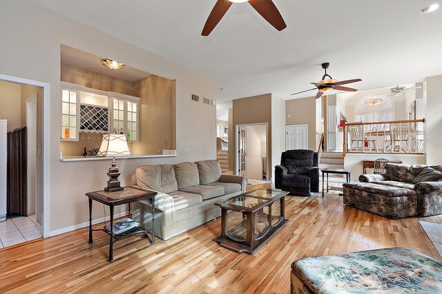 living room with light hardwood / wood-style flooring