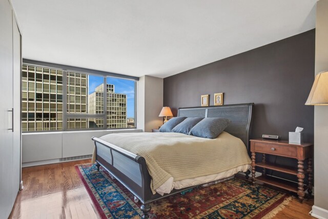 bedroom featuring hardwood / wood-style flooring