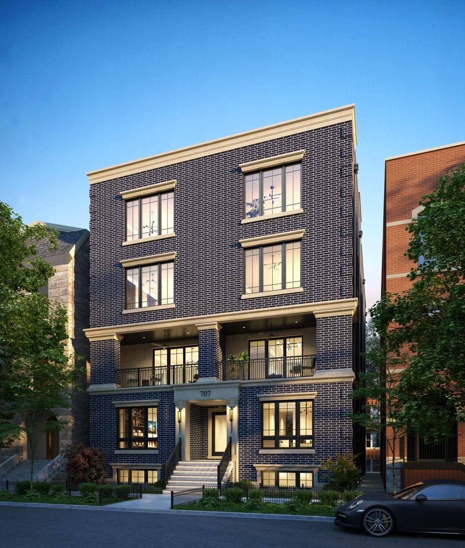 707 W Briar Pl Unit 2W, Chicago, IL 60657 - view of front of property featuring brick siding and a balcony