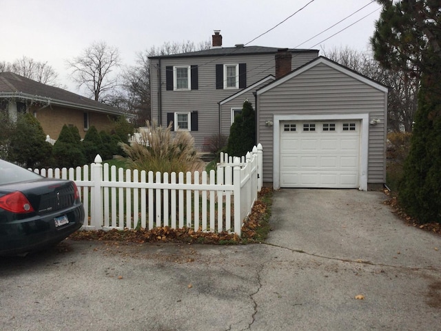 front of property featuring a garage