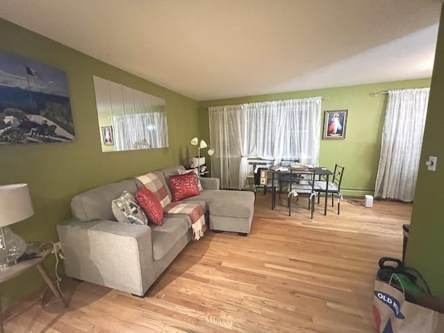 living room with light hardwood / wood-style floors