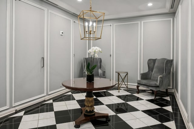 sitting room featuring tile patterned floors, a notable chandelier, and ornamental molding