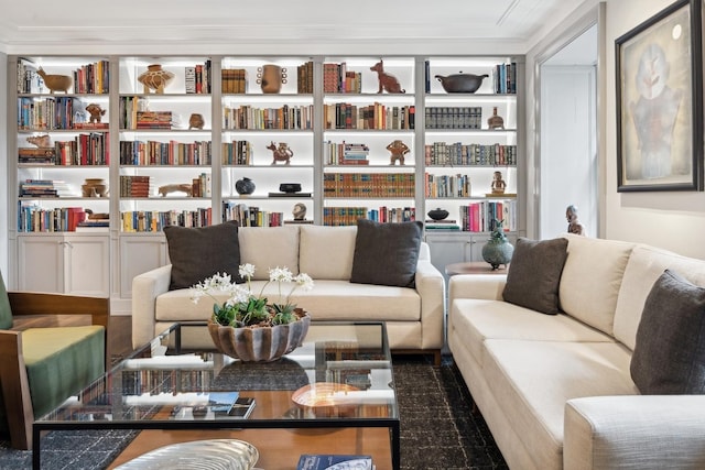 living room with crown molding and wood-type flooring