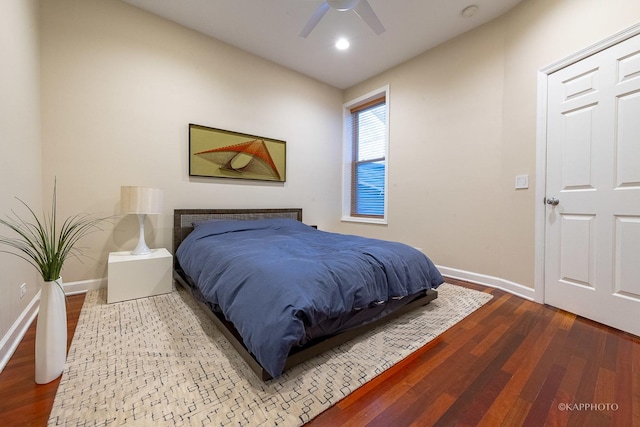 bedroom with ceiling fan and hardwood / wood-style floors