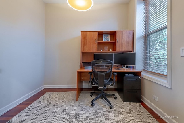 office with light wood-type flooring