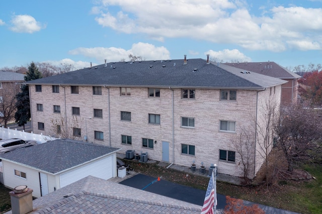 view of building exterior featuring central AC unit