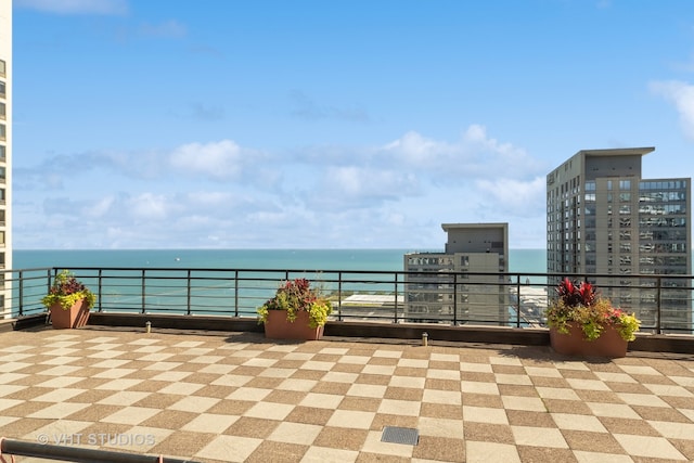 view of patio / terrace featuring a water view