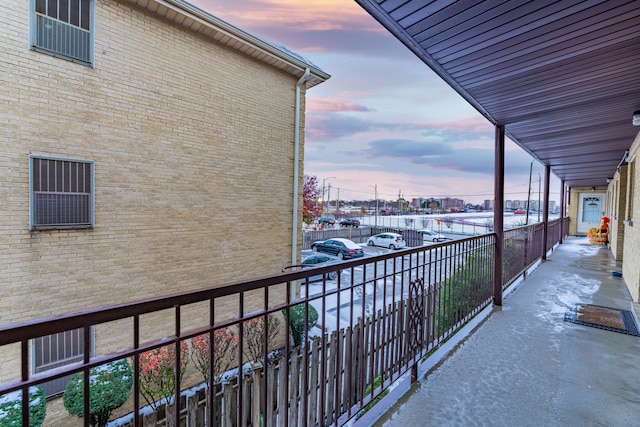 view of balcony at dusk