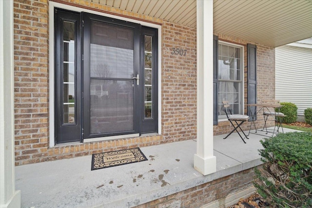 property entrance with covered porch