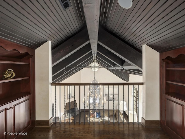 room details with wooden ceiling, hardwood / wood-style flooring, a chandelier, and beamed ceiling