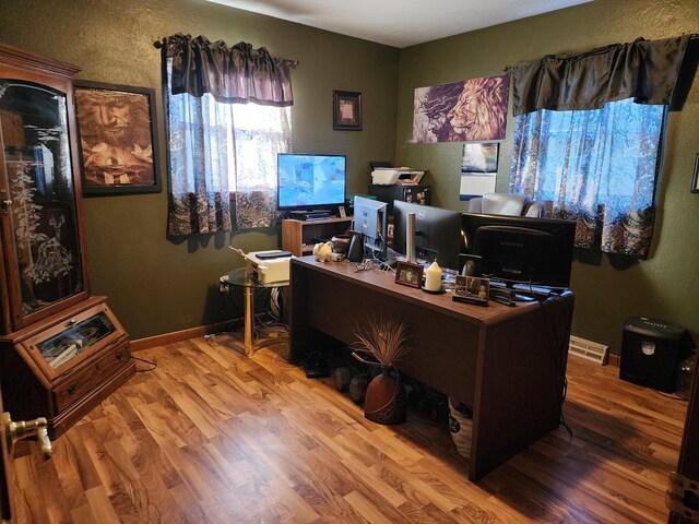 office with hardwood / wood-style floors