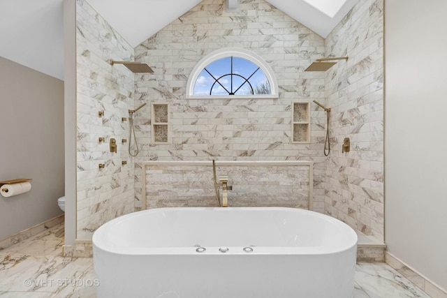 bathroom featuring separate shower and tub, toilet, and vaulted ceiling