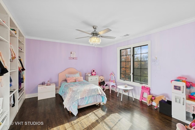 bedroom with ceiling fan, crown molding, and dark hardwood / wood-style floors